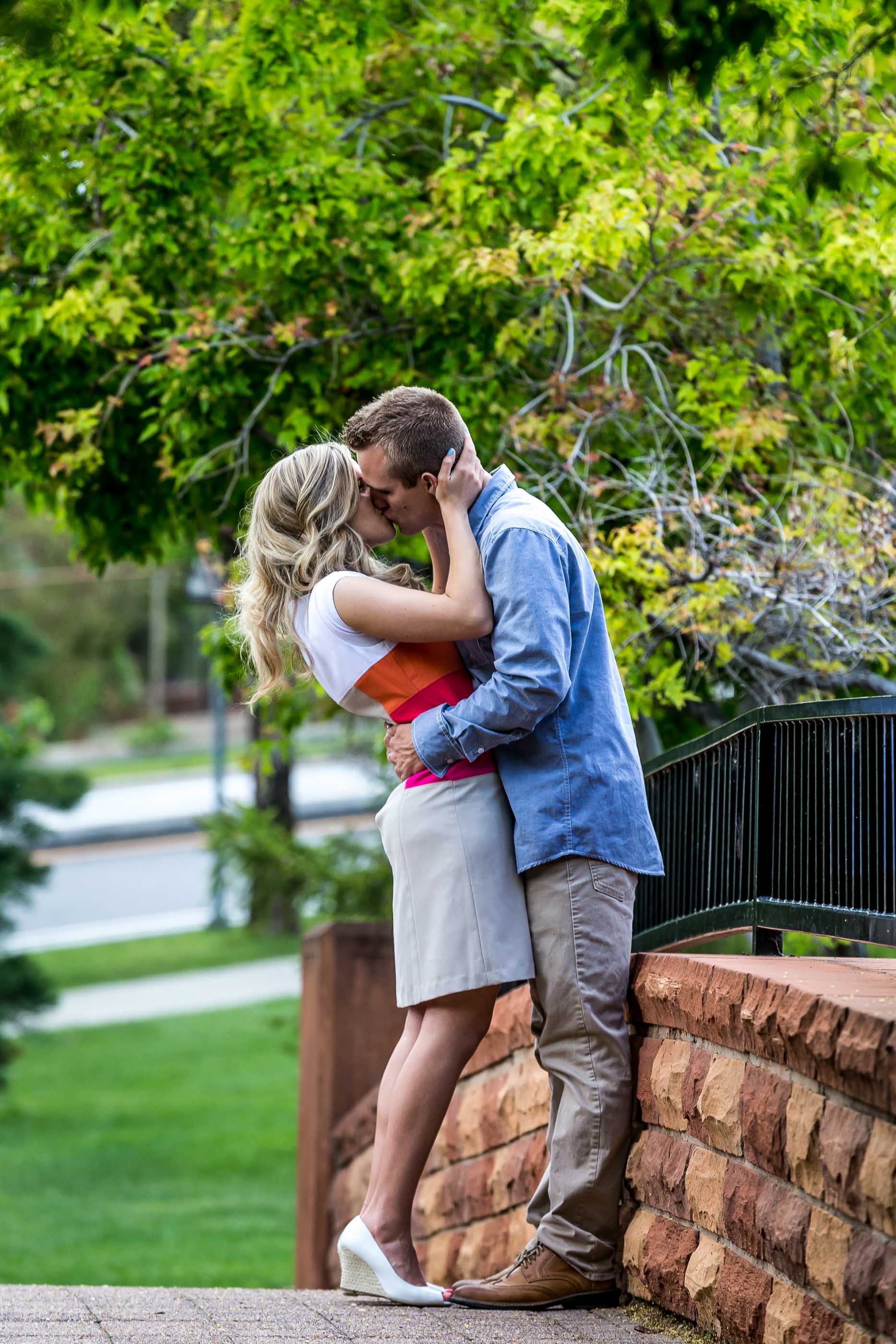 Zack Sarah Prince Engagement Cedar City kissing on Bridge